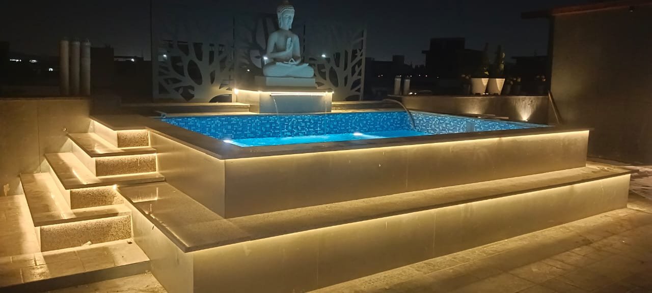 Swimming pool with deck surround